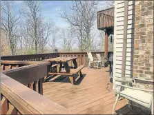  ?? CONTENT AGENCY] [TIM CARTER/TRIBUNE ?? This deck in West Virginia gets punishing sunlight all day. Deck sealers are no match for the sun.