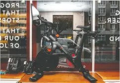  ?? SCOTT HEINS / GETTY IMAGES FILES ?? Exercise bike company Peloton is seeking to cancel a rival’s trademarks for the terms “spin” and “spinning,” arguing the terms are now “part of the fitness lexicon.”