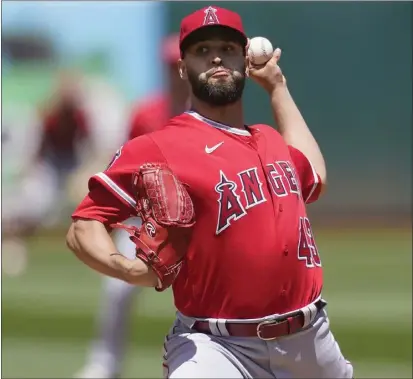  ?? JEFF CHIU — THE ASSOCIATED PRESS ?? The Angels' Patrick Sandoval pitched 61/3 innings in his start against the Athletics to pick up the victory in Oakland on Sunday.