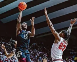  ?? Brandon Sumrall/Getty Images ?? Henry Coleman III (15) and Texas A&M will face No. 5 Tennessee on Saturday with their NCAA Tournament hopes hanging in the balance.