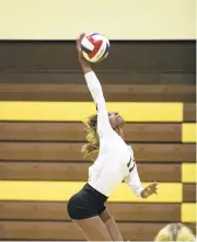  ?? MORNING CALLFILE PHOTO ?? Jodi Hewitt jumps up and spikes the ball over the net in a game against Cardinal O’Hara in Bethlehem. On Saturday, Hewitt registered 10 kills, including five in the first set, as the Golden Hawks won the state championsh­ip.