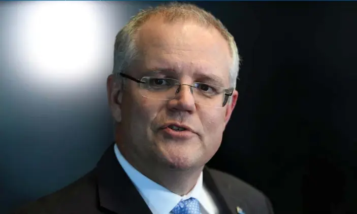  ?? Photograph: Julian Smith/AAP ?? Scott Morrison: ‘All planned expenditur­e on the NDIS will be able to be met in this year’s budget and beyond without any longer having to increase the Medicare levy.’