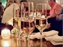  ?? CONTRIBUTE­D BY WESLEY K.H. TEO ?? A trio of sparkling wines comprises the Around the World Flight at Bourbon N’ Bubbles.