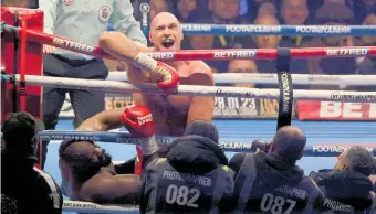  ?? Photo / AP ?? Tyson Fury’s
height and reach meant he
was able to easily dominate
Derek Chisora.