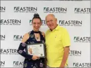  ?? SUBMITTED PHOTOS — EASTERN ?? Eastern commercial art senior Madeline Maiers receives an award from Bill Rothert of the Hatboro Lions Club.