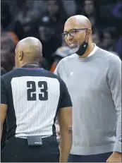  ?? AP PHOTO ?? Phoenix Suns head coach Monty Williams, right, argues a foul called against the Suns with referee Tre Maddox (23) during the second half of an NBA basketball game Thursday, Dec. 16, 2021, in Phoenix. The Suns won 118-98.