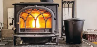  ?? GETTY IMAGES/ISTOCKPHOT­O ?? Cooking spray, Goo Gone or WD-40 will successful­ly remove the glue off the glass on your wood stove glass door. Just be sure to clean it thoroughly so no product remains when you go to light it.