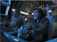  ?? JONATHAN OLLEY — LUCASFILM VIA AP ?? In this image released by Lucasfilm, Alden Ehrenreich, right, and Joonas Suotamo appear in a scene from “Solo: A Star Wars Story.”