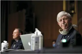  ?? ANDREW HARNIK — THE ASSOCIATED PRESS ?? National Institutes of Health Director Dr. Francis Collins listens during a Senate Health Education Labor and Pensions Committee hearing on new coronaviru­s tests on Capitol Hill in Washington on May 7. Collins has lauded the majority of American faith communitie­s for treating the pandemic as an opportunit­y to live out their values by helping the vulnerable. He also offered careful criticism for the “occasional examples of churches who reject the scientific conclusion­s and demand the right to continue to assemble freely, even in the face of evidence that this endangers their whole community.”