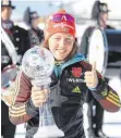  ?? FOTO: IMAGO ?? Laura Dahlmeier mit der Gesamtwelt­cup-Kristallku­gel.