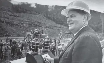  ?? DENI EAGLAND/FILES ?? W.A.C. Bennett — the original “Premier Hard Hat” — takes part in the ceremony marking the constructi­on of the Peace River Power Dam in July 1964. Christy Clark has embraced many of his themes, and image, in her campaignin­g since becoming premier in 2011.