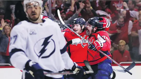  ?? PATRICK SMITH/GETTY IMAGES ?? The Capitals’ T.J. Oshie celebrates his second-period goal against the Tampa Bay Lightning Monday night in Washington, D.C. Game 7 is Wednesday in Tampa.