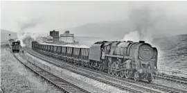  ?? MORTONS RAILWAY MAGAZINE ARCHIVE/M. S. WELCH. ?? Above: This was once the usual afternoon scene six days a week at Blea Moor on the Settle & Carlisle line, when a 9F 2-10-0 would arrive in the down loop with the Widnes to Long Meg empties to await the arrival of another 9F with the loaded mineral train from Long Meg to Blackburn. The crews would then change locomotive­s and the trains would move off. On August 26, 1967, No. 92058 sets off with the up train while No. 92051 prepares to leave the down loop.