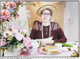  ??  ?? Library Assistant Elle Supencheck hosts an online Victorian tea party in September in honor of Edith Abbott, for whom the library is named. This is one of several programs made available virtually by the library following the pandemic.