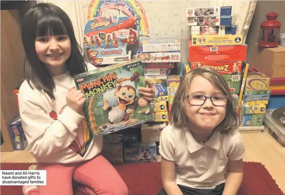  ??  ?? Naomi and Ali Harris have donated gifts to disadvanta­ged families