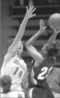  ?? PAT VASQUEZ-CUNNINGHAM/JOURNAL ?? UNM’s Jourdan Erskine (14) defends against Cal State Fullerton’s Brianna Barfield (23) during their game Tuesday night.