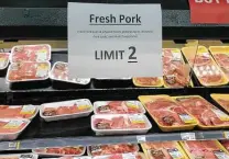  ?? Jeff Amy / Associated Press ?? The fallout from shutting slaughterh­ouses because of the pandemic has left meat cases at grocery stores across the U.S. with fewer supplies and has driven up prices.