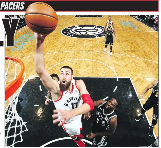  ?? S. BUTLER/GETTY IMAGES ?? With his improved defence, Raptors’ Jonas Valanciuna­s has gained the trust of his coaches late in games this season.