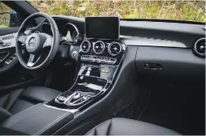  ?? NICK TRAGIANIS/DRIVING ?? A look at the inside the 2018 Mercedes-Benz C300, above, and the Genesis G70.