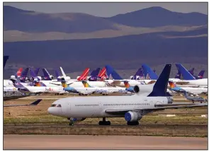  ?? (AP) ?? Southern California Logistics Airport in Victorvill­e, Calif., was storing an array of passenger and cargo aircraft in March.