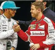  ?? Foto: Azhar Rahim ?? Lewis Hamilton und Sebastian Vettel gelten als große Favoriten auf den WM-Titel.