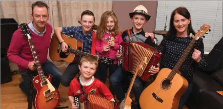  ?? Photo by Domnick Walsh ?? A musical bunch: Kilflynn Late Late Toy Show performers Daragh (13) and Conor Breen (11) with their equally talented family – dad Tom, sister Sarah, brother Thomas and mom Maura.