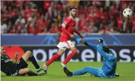  ?? Photograph: Tiago Petinga/EPA ?? Benfica's Rafa Silva (centre) scores in the win against Juventus