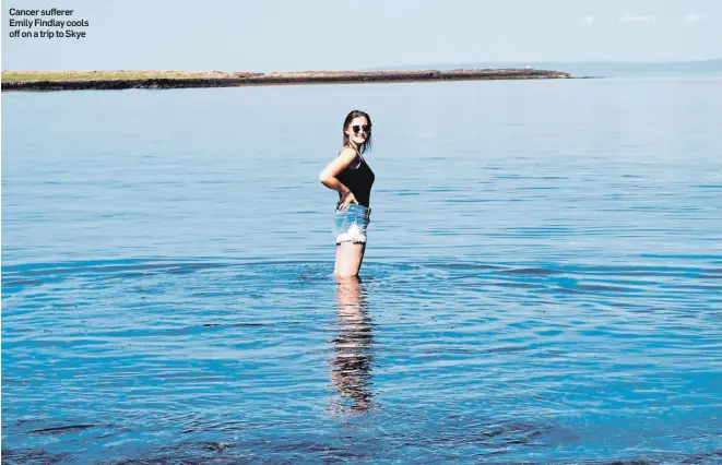  ??  ?? Cancer sufferer Emily Findlay cools off on a trip to Skye