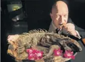  ??  ?? Amazon CEO Jeff Bezos eating roasted iguana at the Explorers Club Annual Dinner in New York EMILY V. DRISCOLL/BONSCI FILMS