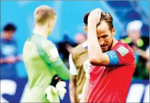  ?? AFP ?? England forward Harry Kane reacts after losing to Belgium in their Russia 2018 World Cup third place playoff at the St Petersburg Stadium on Saturday.