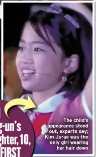  ?? ?? The child’s appearance stood out, experts say; Kim Ju-ae was the only girl wearing her hair down