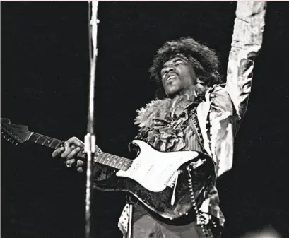  ?? Michael Ochs Archives / Getty Images 1967 ?? Jimi Hendrix performs at the 1967 Monterey Pop Festival — before setting his guitar ablaze.