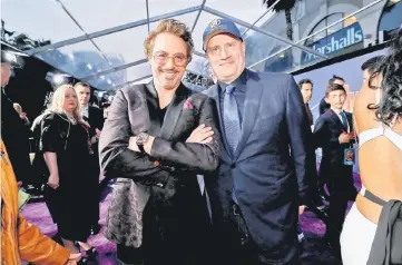  ?? — Reuters file photo ?? Actor Robert Downey Jr. (Left) and Kevin Feige, President of Marvel Studios at the premiere of ‘Avengers: Infinity War’ in Los Angeles, California, US last month.