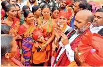  ?? — BY ARRANGEMEN­T ?? Telangana state BJP president Bandi Sanjay Kumar interacts with the crowd during the 28th day of his Praja Sangrama Yatra in Kothapet village, Shadnagar on Wednesday.