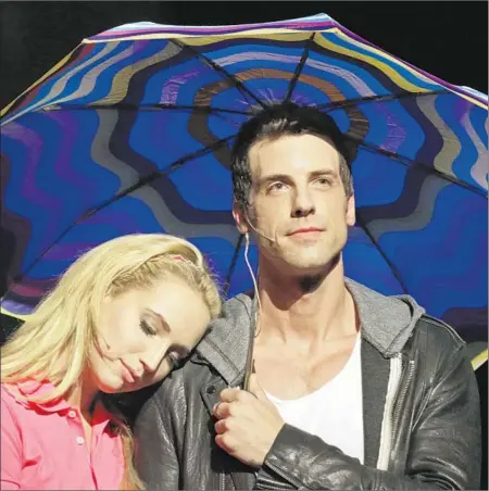  ?? Lawrence K. Ho
Los Angeles Times ?? MOLLY McCOOK as Marissa and Tilky Jones as Ryan in a performanc­e of “The Unauthoriz­ed O.C. Musical” at the Montalban.