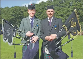  ?? Photograph: Kevin McGlynn. ?? Left: Darach Urquhart, left, won the silver medal at this year’s Argyllshir­e Gathering, while New Zealand’s Stuart Easton took the gold medal.