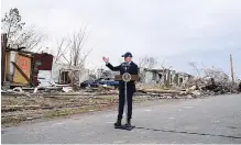  ?? AP PHOTO/ANDREW HARNIK ?? President Joe Biden speaks after surveying storm damage from tornadoes and extreme weather in Dawson Springs, Ky., on Dec. 15. His $2 trillion Build Back Better plan contains $550 billion in spending and tax credits aimed at promoting clean energy.