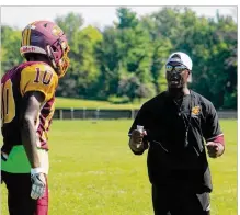  ?? NICK NOVY/CONTRIBUTE­D ?? Loyd Bradley Jr. (right) felt something was missing in his life, so he contacted Central State football coach Cedric Pearl and volunteere­d as an assistant coach.