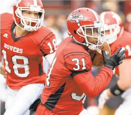  ?? DAVID GARRETT/SPECIAL TO THE MORNING CALL ?? Easton’s Marcus Williams (31) and the Red Rovers beat Phillipsbu­rg 16-13 in their Thanksgivi­ng game at Lafayette College’s Fisher Stadium in 2019. The pandemic forced last year’s matchup to be canceled.