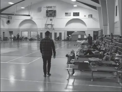  ?? ?? DOWN TIME— Arctic Eagle participan­ts relax at the Rec Center during their down time at the end of the exercise. They were housed at the Nome Rec Center and at NACTEC.