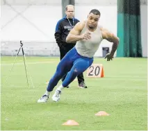  ?? ALLEN McINNIS ?? Carabins receiver Régis Cibasu’s best time in the 40-yard dash was 4.8 seconds during his pro workout day Monday.