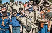  ?? JAKE MAY/THE FLINT (MICH.) JOURNAL ?? The Boy Scouts will allow girls to join Cub Scout packs next year. A program for older girls will begin in 2019.
