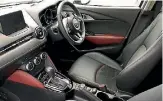  ??  ?? Quite a bit has been done to the CX-3’s interior. At the Limited level there’s this nice two-tone leather upholstery.