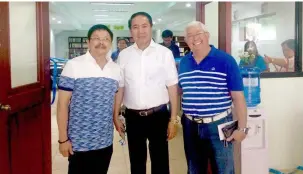  ??  ?? Batch ‘66 alumni Renato Legazpi, LevyP. Laus, and Alex Dayrit pose for the camera during the blessing rites of Don Bosco-Bacolor’s new school building.