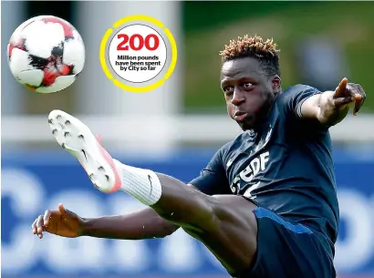  ?? AFP file ?? Manchester City’s new recruit Benjamin Mendy kicks the ball during a training session. —