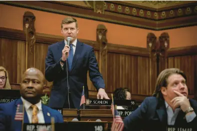  ?? COURANT FILE PHOTO ?? State Comptrolle­r Sean Scanlon, then House chairman of the Finance, Revenue and Bonding committee, on the floor of the House.