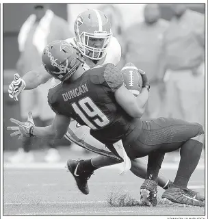  ?? AP/MARK HUMPHREY ?? Georgia linebacker Roquan Smith (top), shown tackling Vanderbilt wide receiver C.J. Duncan on Oct. 7, said the Bulldogs’ No. 4 national ranking means little at this point. “You see those things running across your news feed, but that’s not going to...