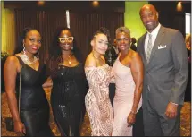  ?? (NWA Democrat-Gazette/Carin Schoppmeye­r) ?? Kheri Henderson (from left), Vonnie Boone, Ashley Smith, Sharon Glover and Rodney Anderson gather at the Celebrity Waiter fundraiser.