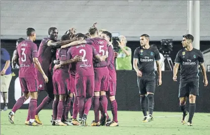  ?? FOTO: AP ?? La alegría de los futbolista­s del City contrasta con la decepción de los del Real Madrid tras el cuarto gol inglés