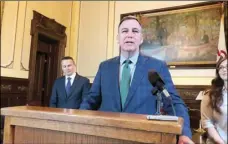  ??  ?? Illinois Department of Agricultur­e Director John Sullivan discusses the opening of the applicatio­n process to grow industrial hemp in Gov. J.B. Pritzker’s office in this April 30, photo. AP PHOTO/JOHN O’CONNOR